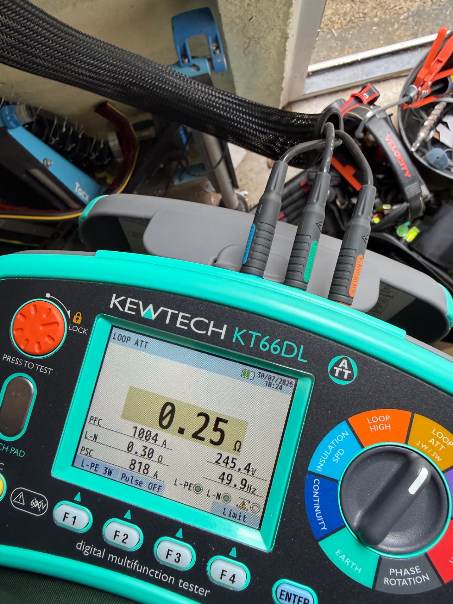 Kewtech multifunction tester displaying loop impedance readings during electrical fault finding