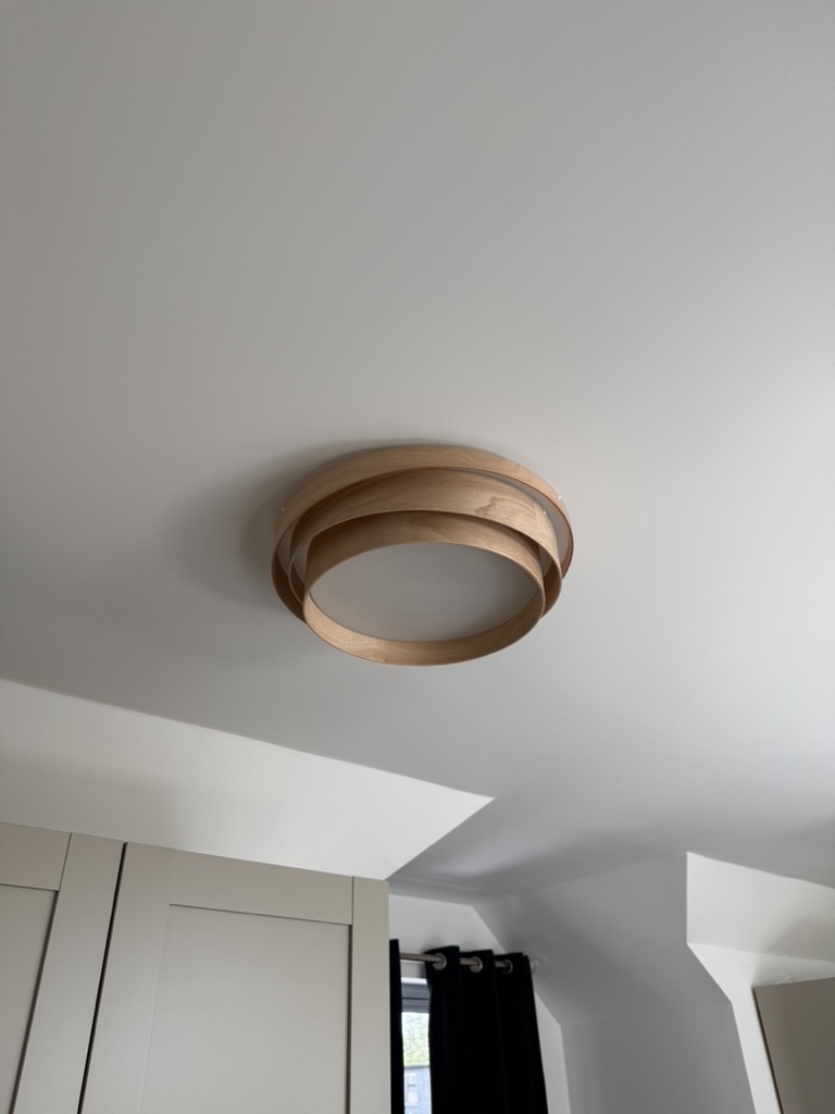 Modern wooden ceiling light fitted by Grid and Glow